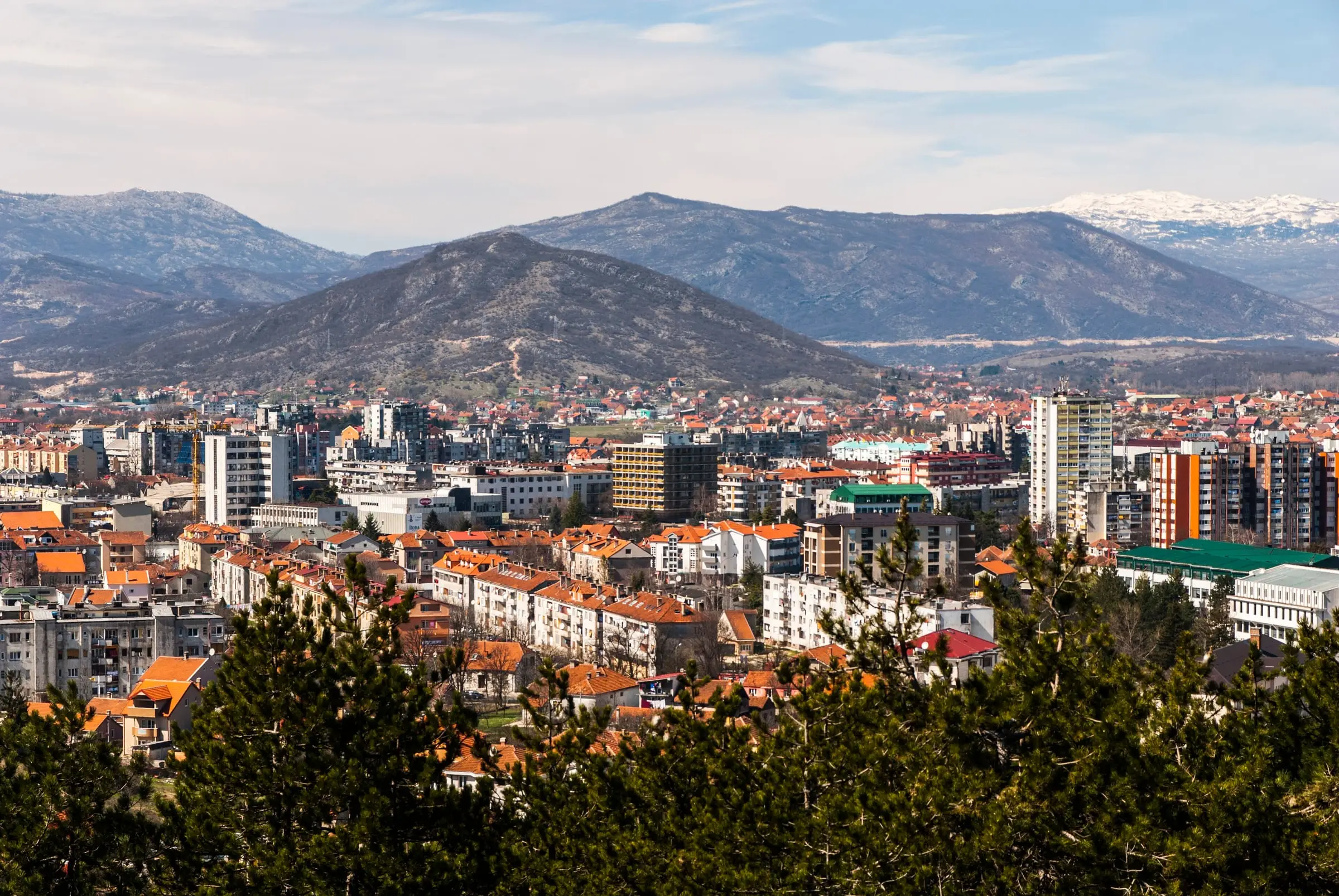 Nikšić town panorama with snow-capped mountains